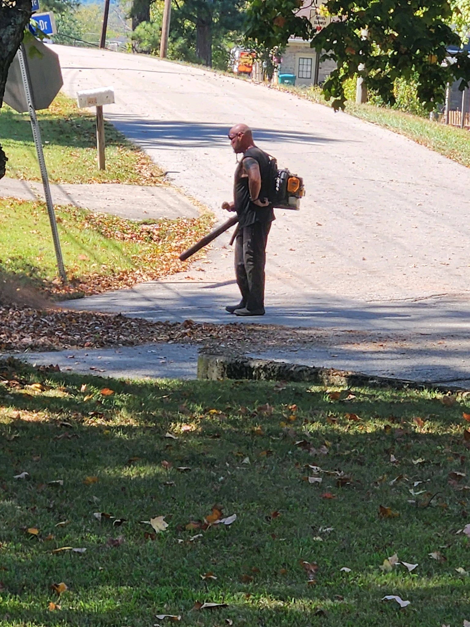 Cutting Edge Lawn landscaping team working on Sudbury residential property