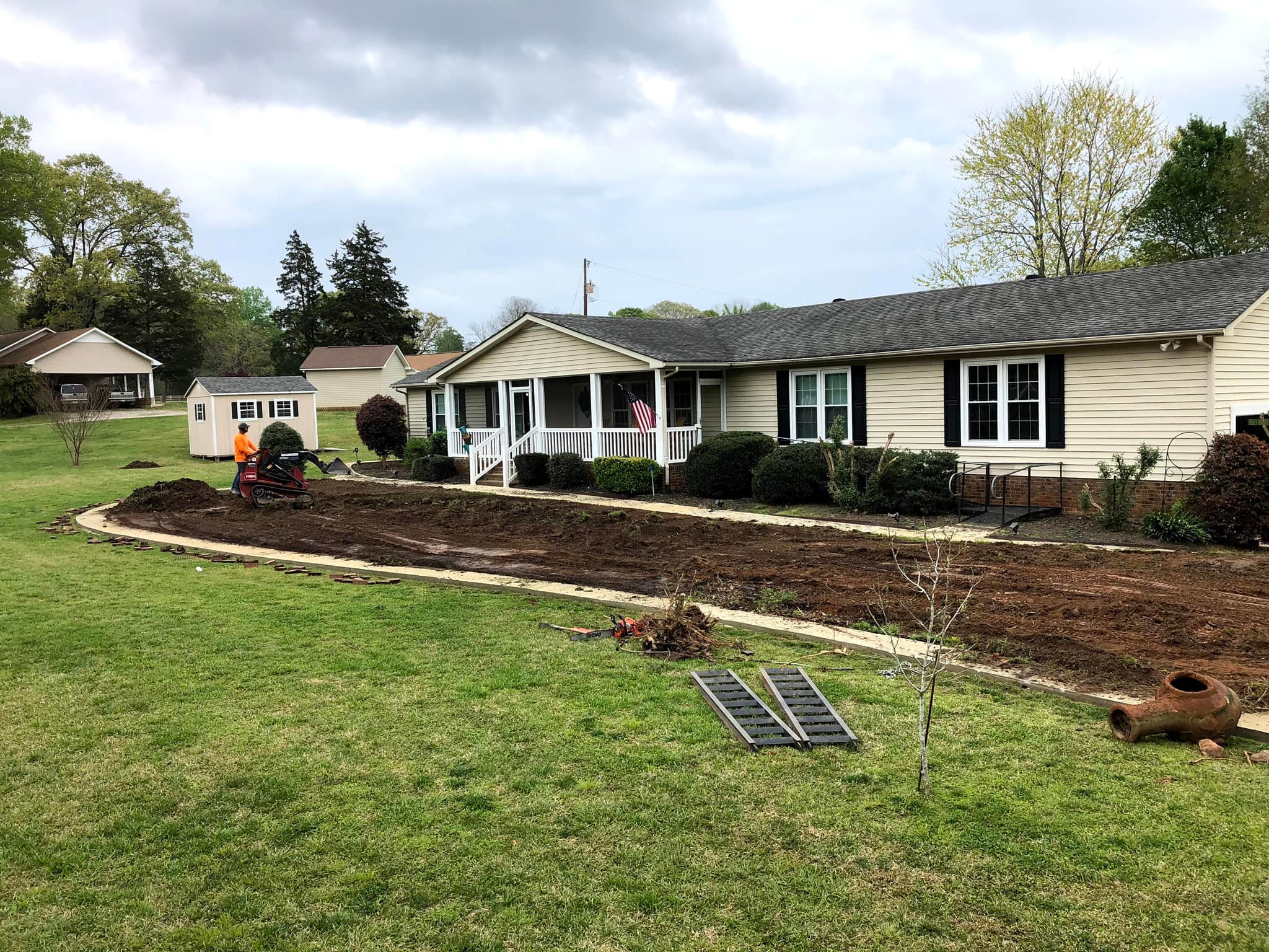 Cutting Edge Lawn owner Ryan working on a Sudbury property