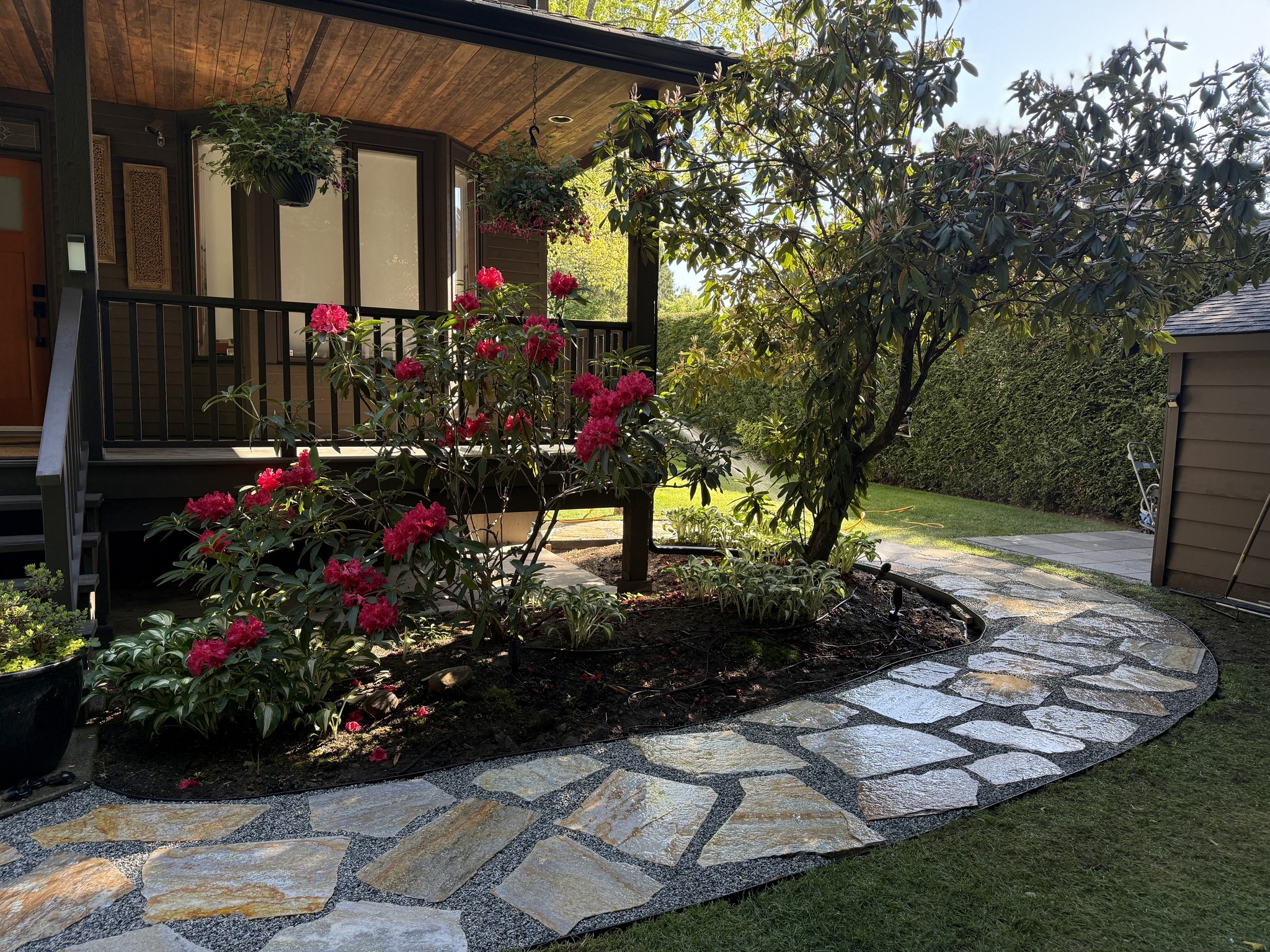 Decorative stone pathway through a residential garden in Greater Sudbury Ontario