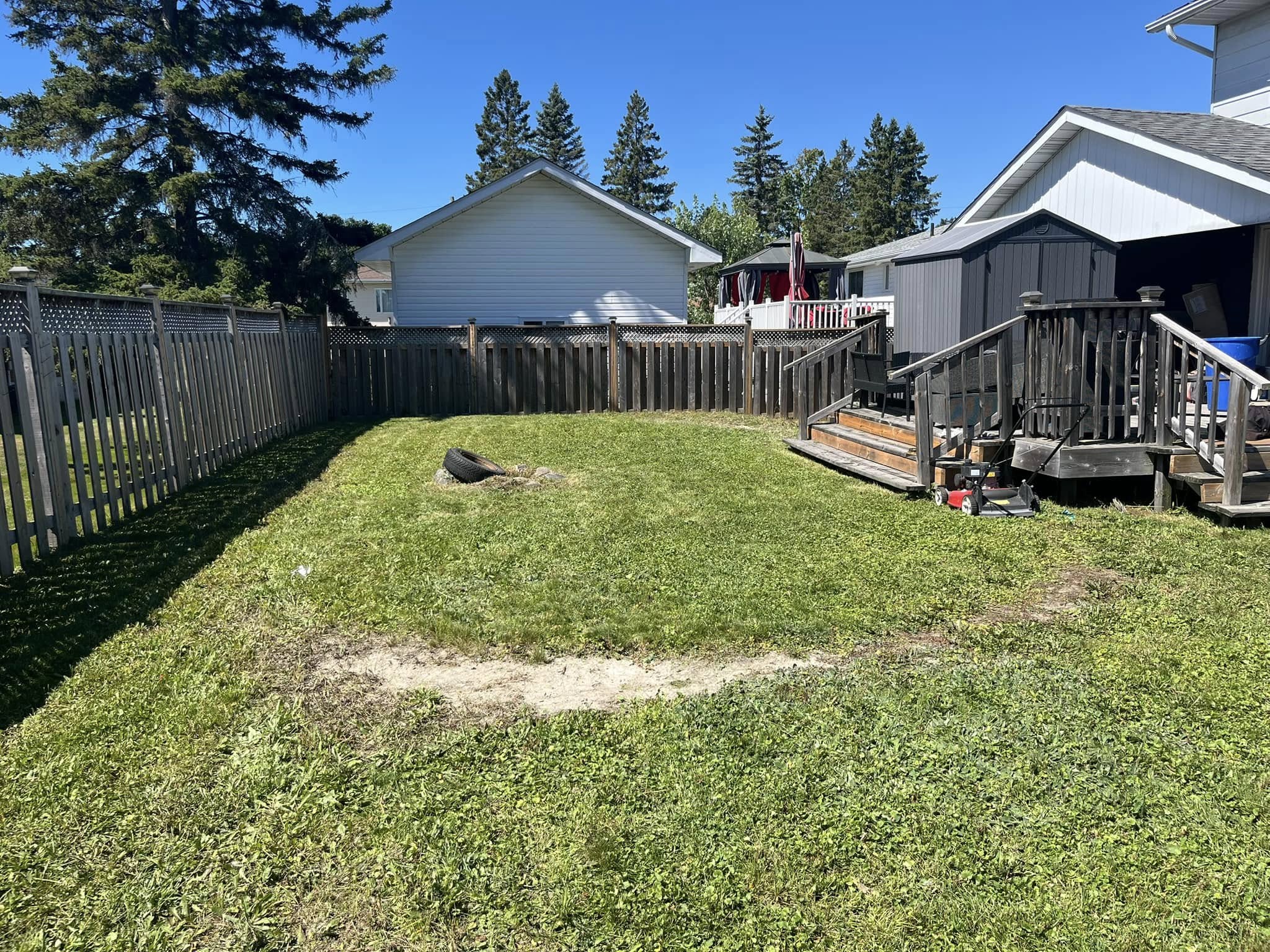 Final autumn lawn mow residential property Sudbury Ontario October