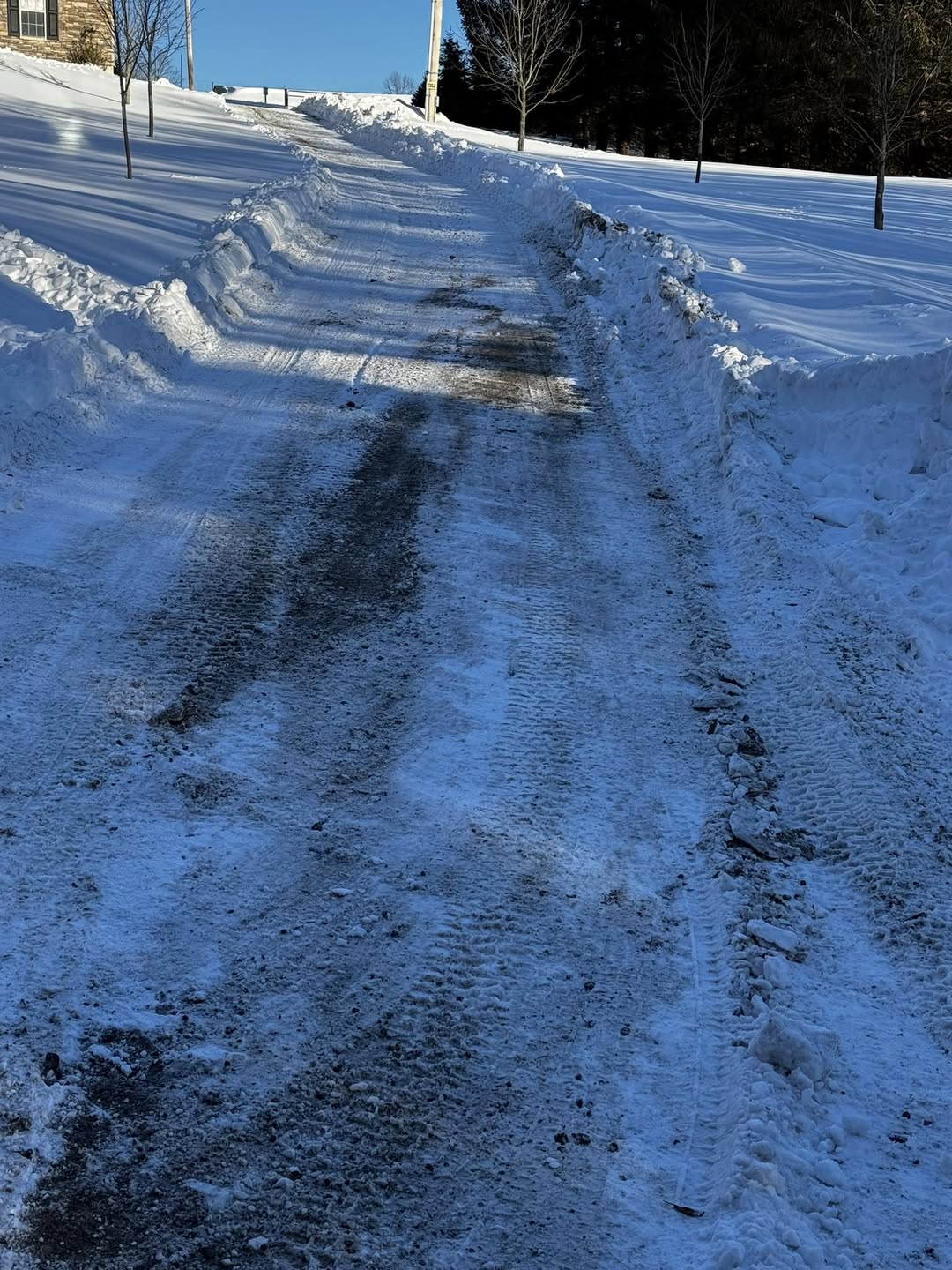 Gravel driveway in winter conditions on a Sudbury Ontario property