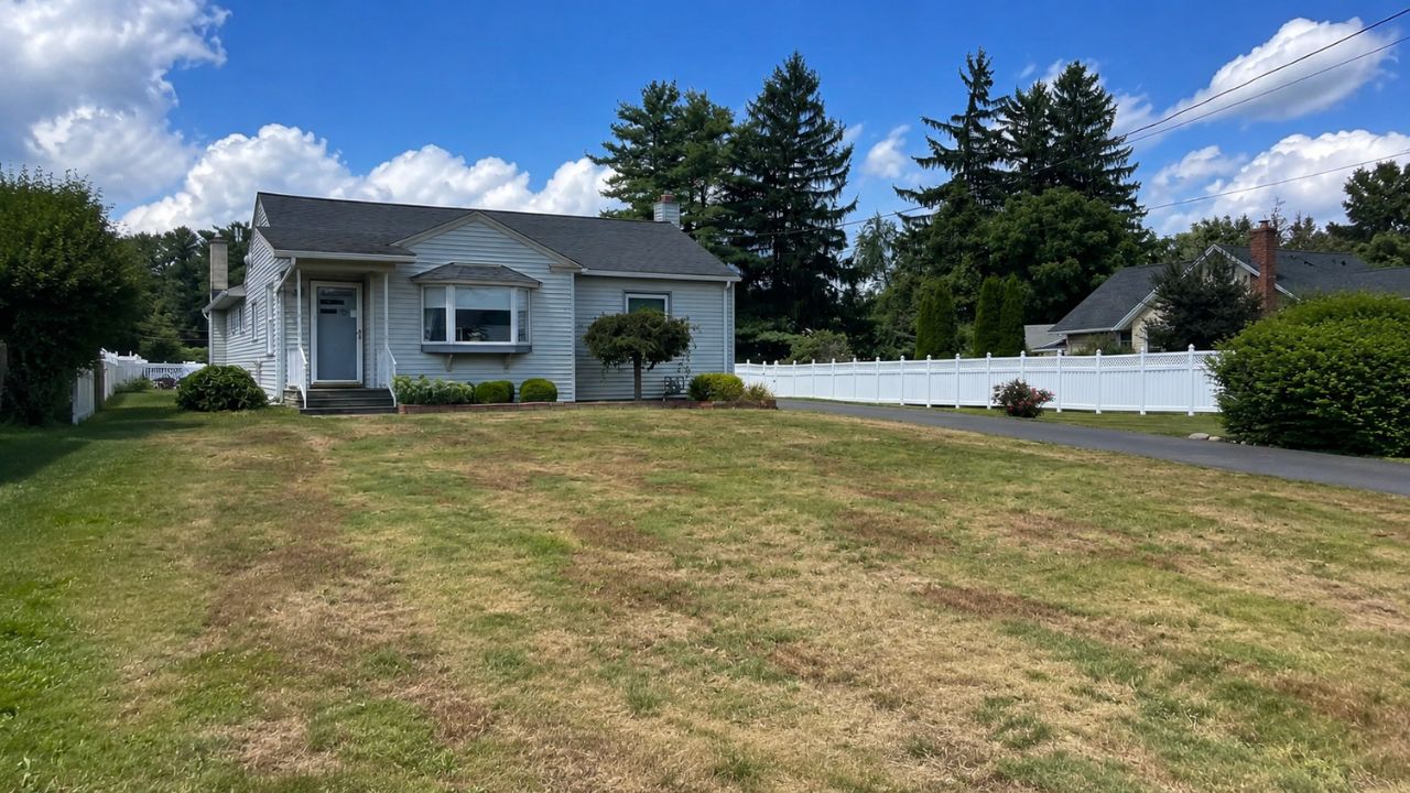 Lawn restoration Val Caron Sudbury before and after Cutting Edge Lawn