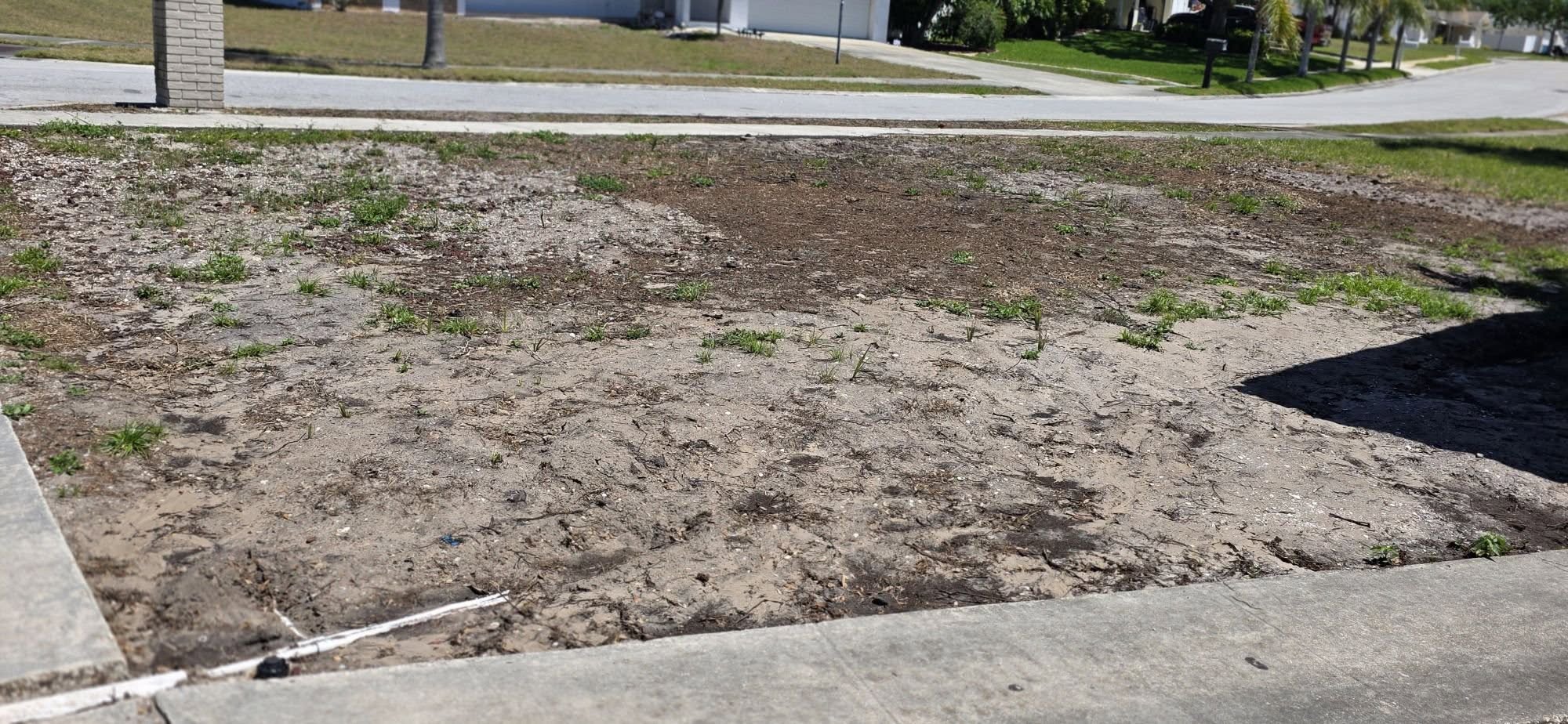 Lawn soil tilling and grading before sod installation