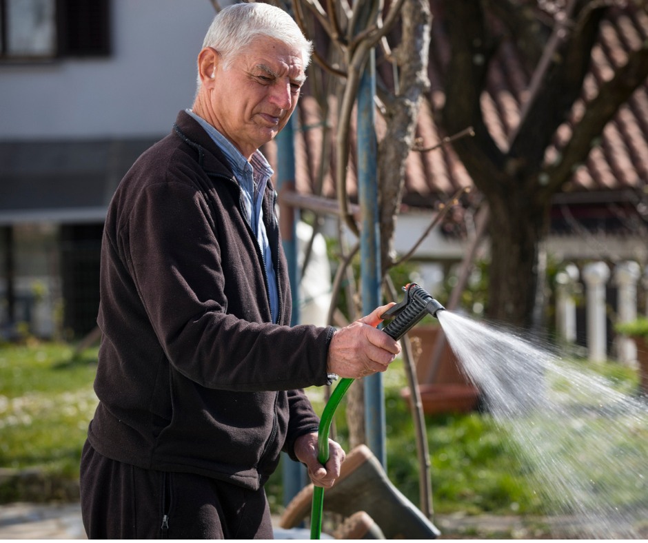 Lawn sprinkler watering a residential property in Greater Sudbury Ontario