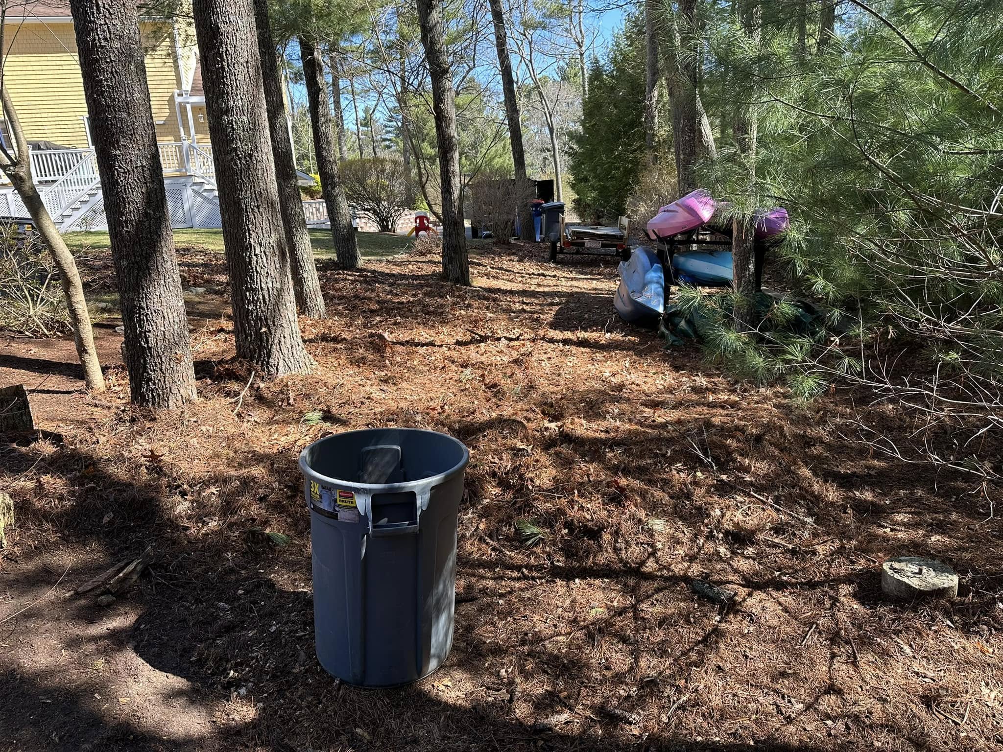 Spring property cleanup being done on a new Sudbury homeowner's lawn