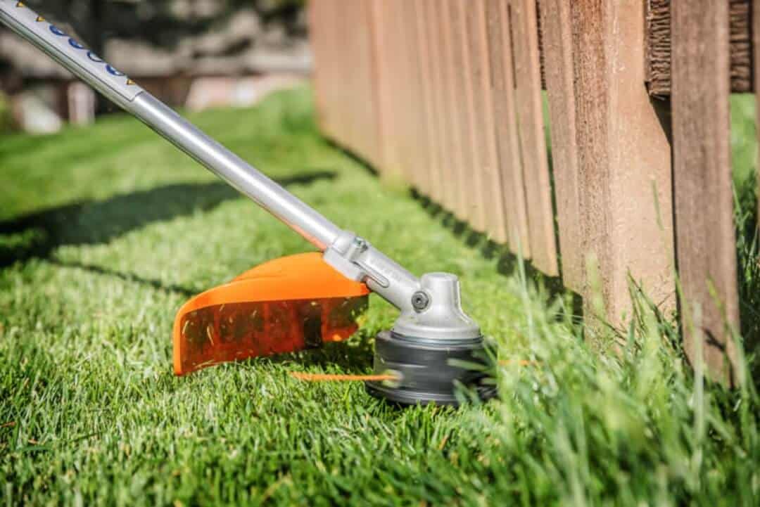 String trimming and edging on Sudbury residential lawn