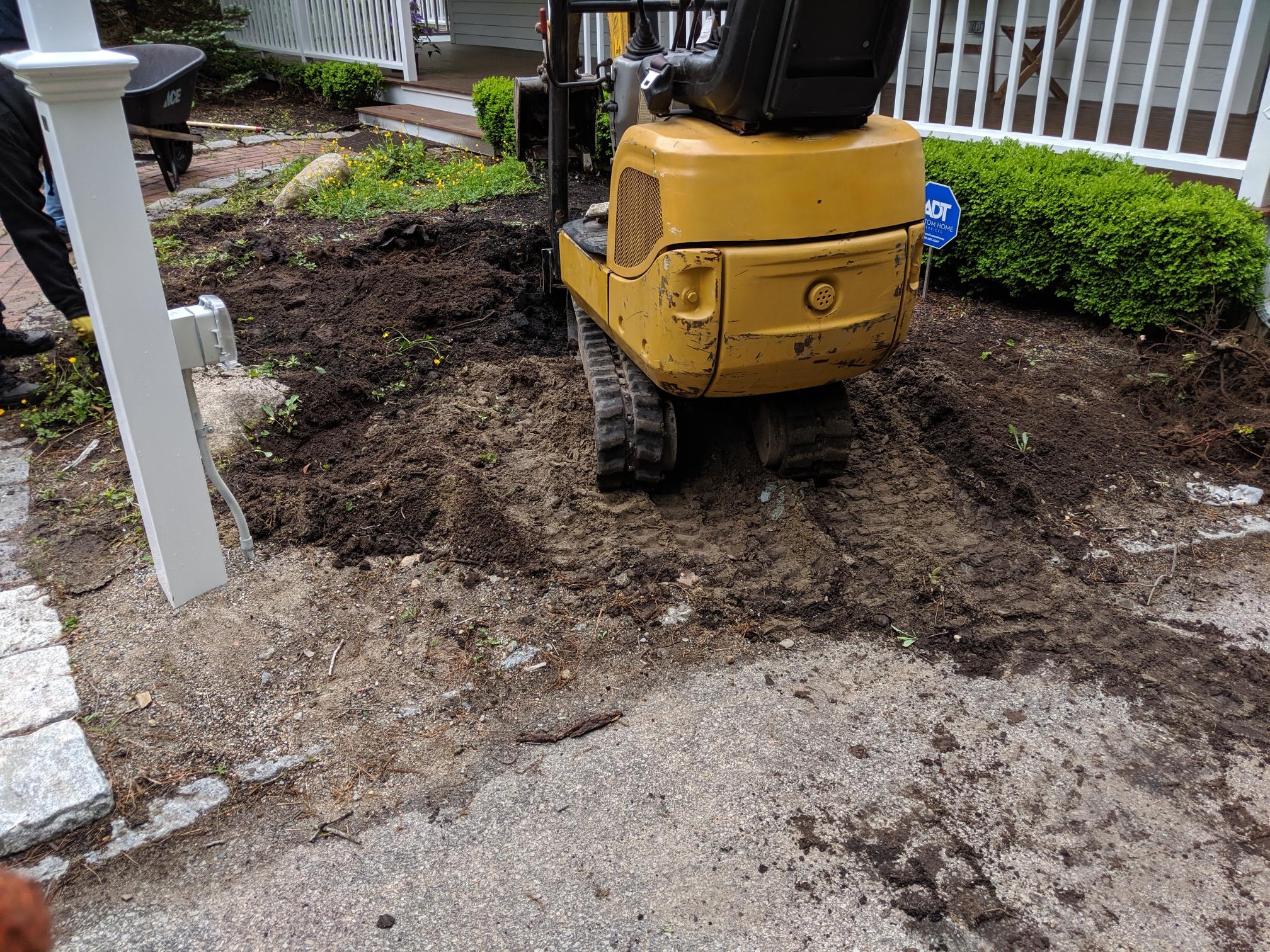 Water pooling on compacted Sudbury lawn