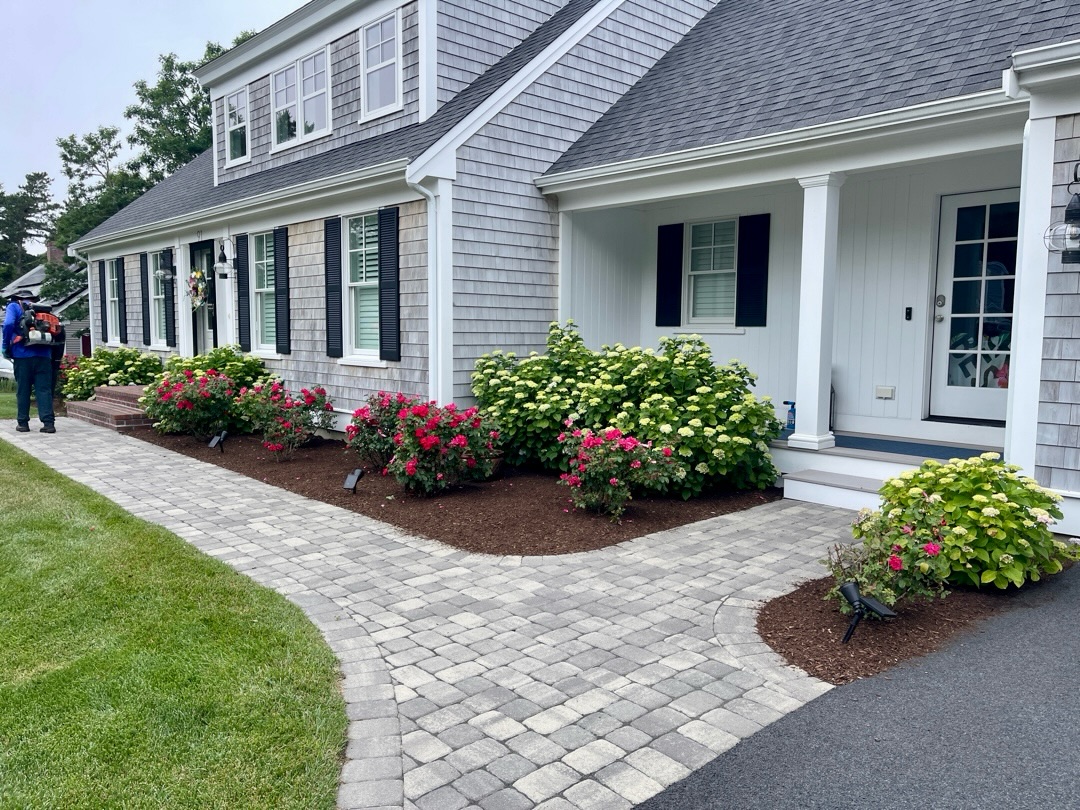 Well designed hardscaping with stone borders and gravel path in Greater Sudbury