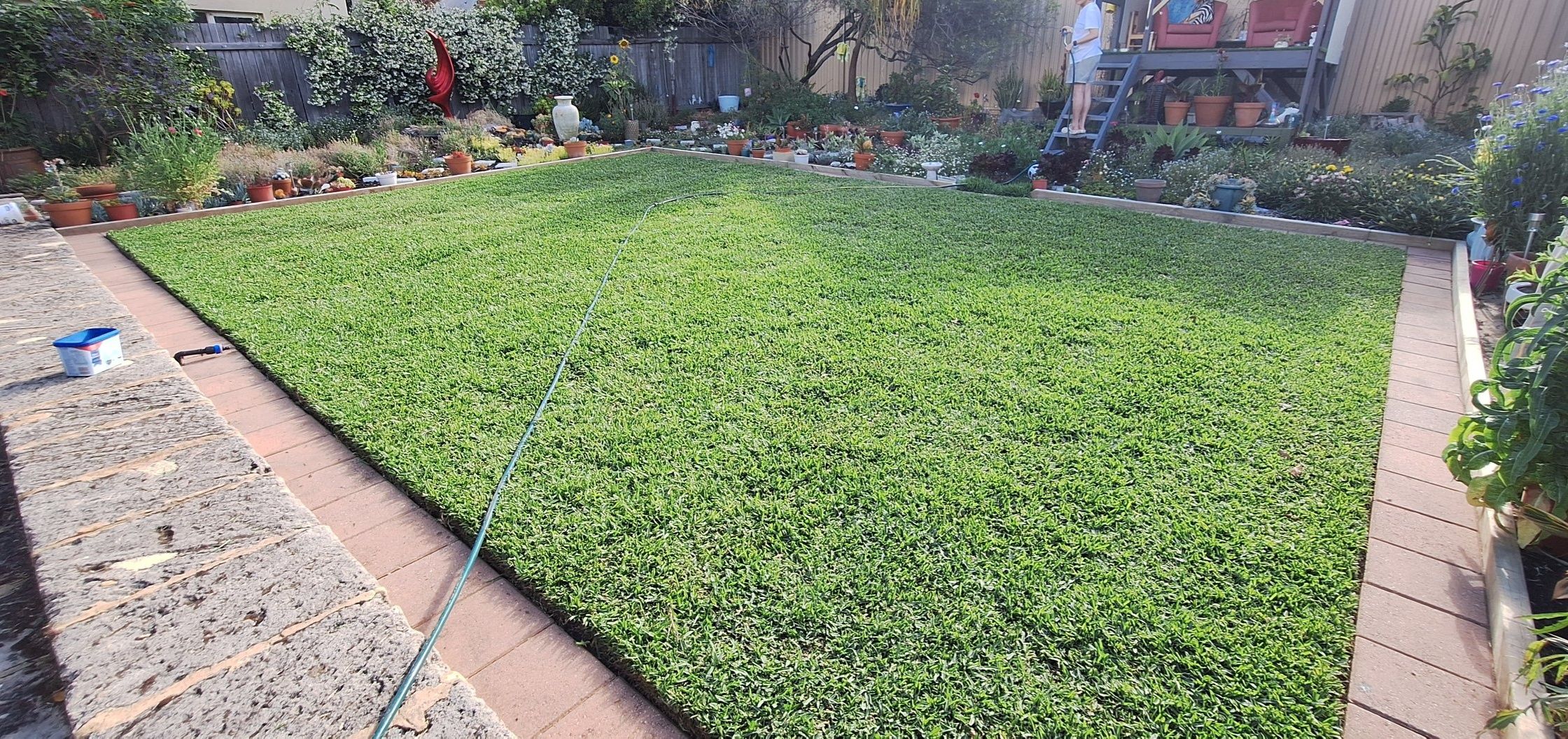 Well maintained front lawn on a residential property in Hanmer Ontario
