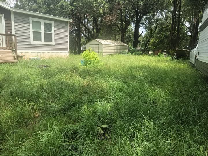 overgrown residential lawn missed cut Greater Sudbury Ontario