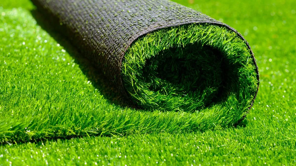 Artificial turf quote documents being reviewed before signing