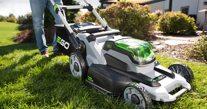 Battery powered mower running on small Sudbury residential lawn