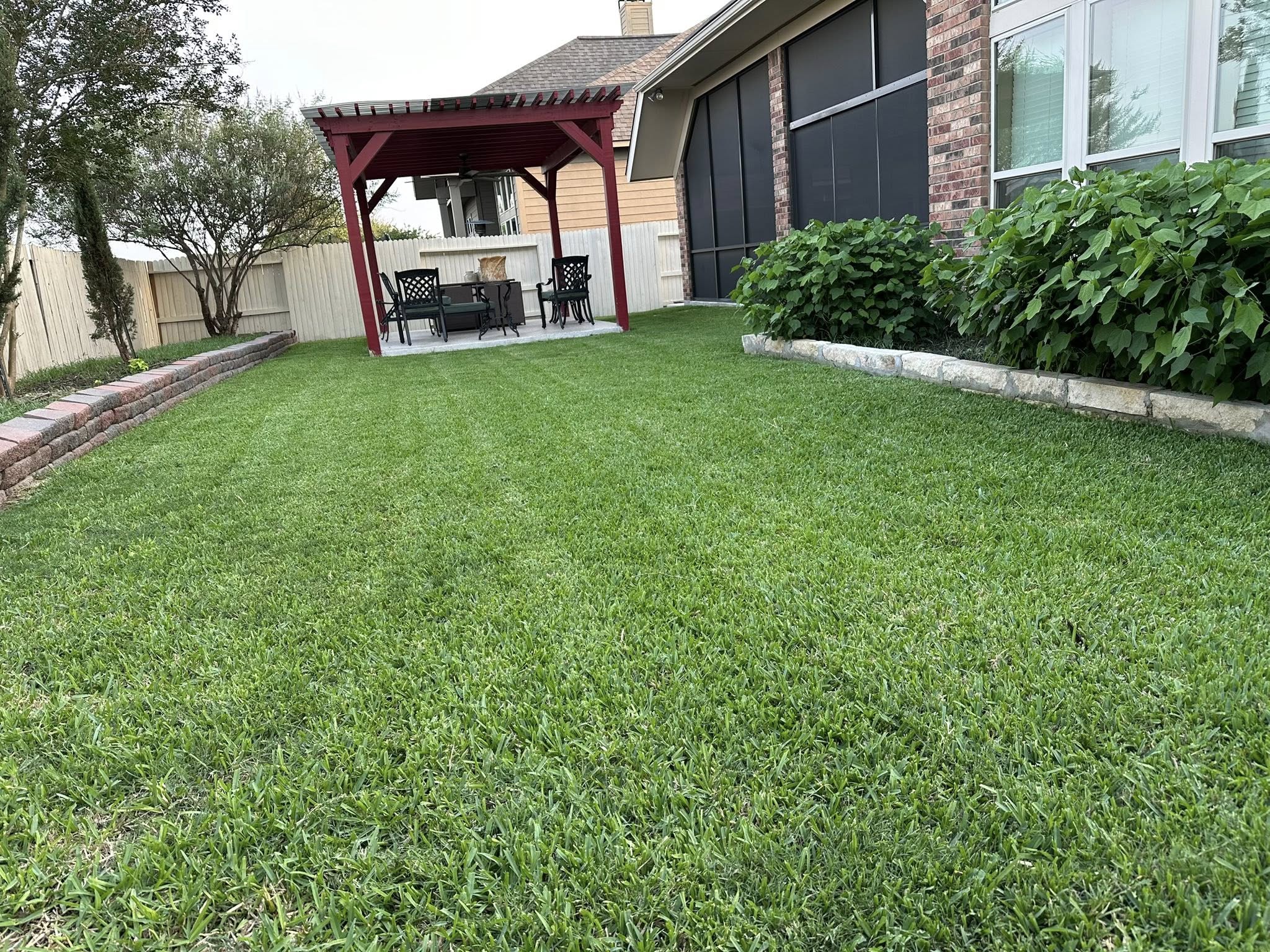 Clean well maintained lawn after professional spring cleanup in Sudbury Ontario