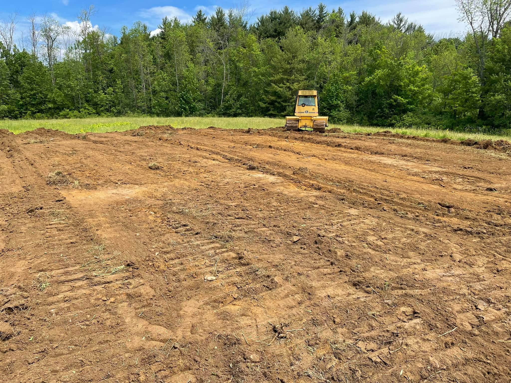 Compacted soil along a property line from neighbouring construction in Sudbury