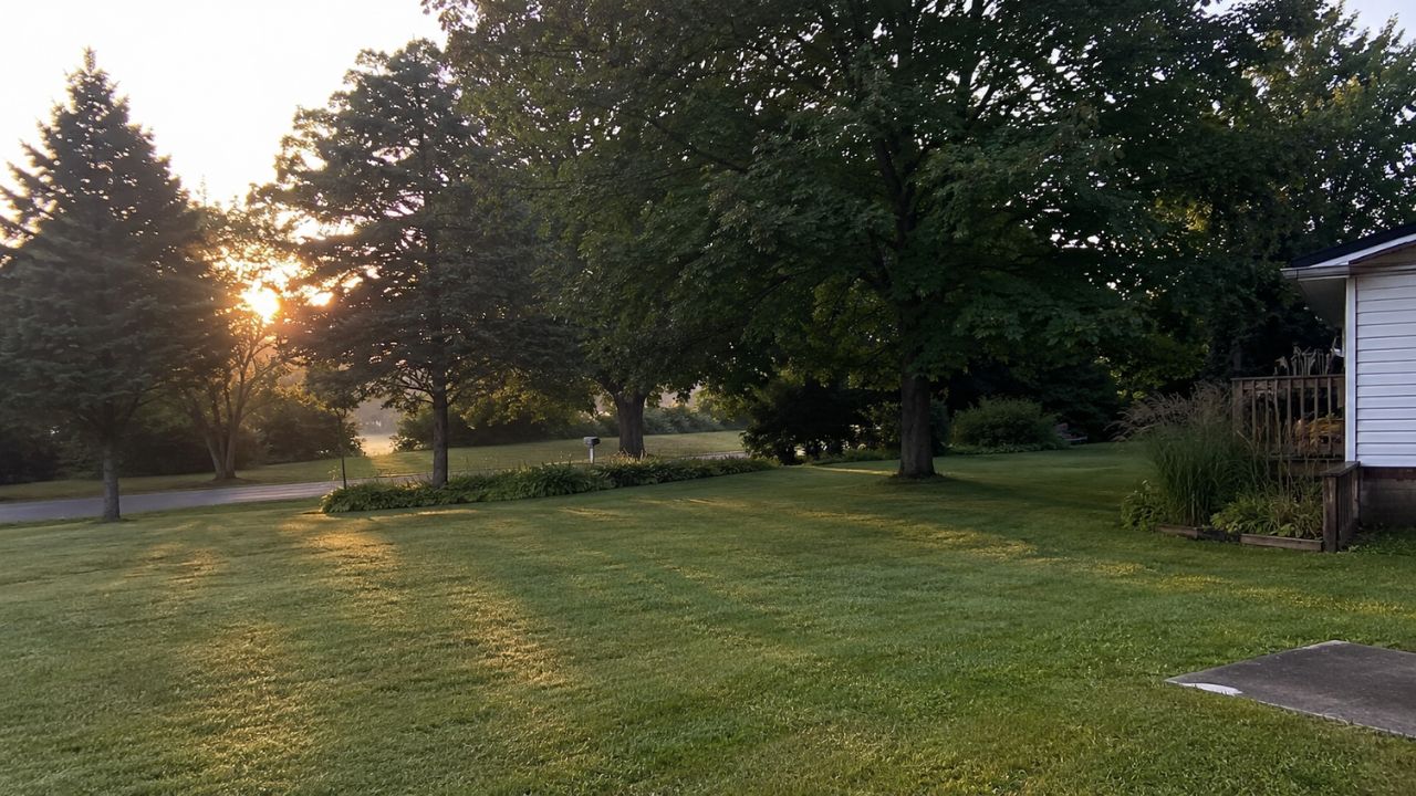 Early morning lawn service arrival Greater Sudbury Ontario — Cutting Edge Lawn and Landscaping
