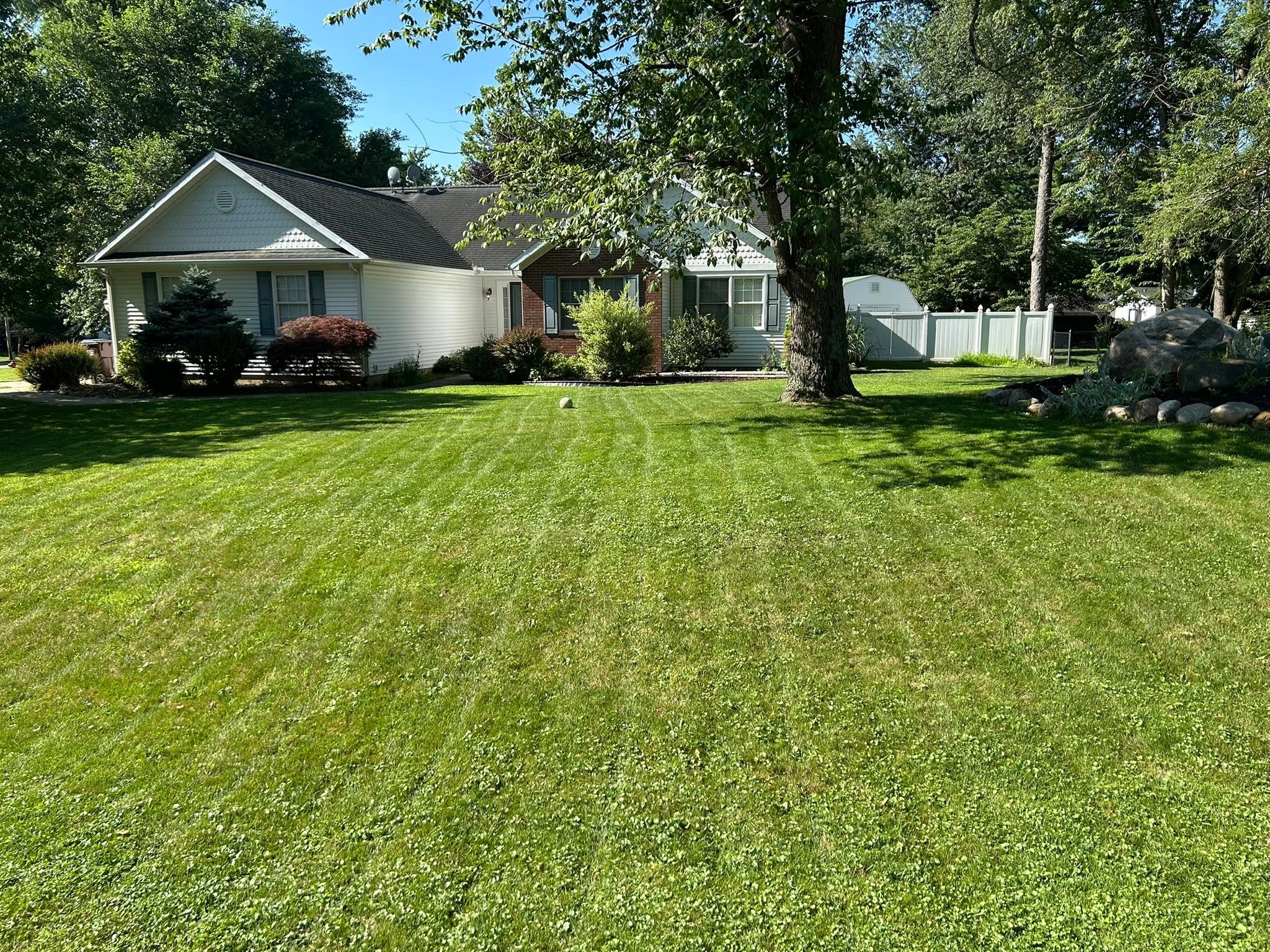 Freshly cut lawn in Greater Sudbury after addressing a bylaw compliance notice