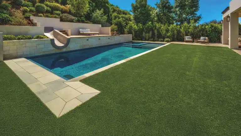Healthy lawn restored around pool area after addressing shade and traffic in Sudbury