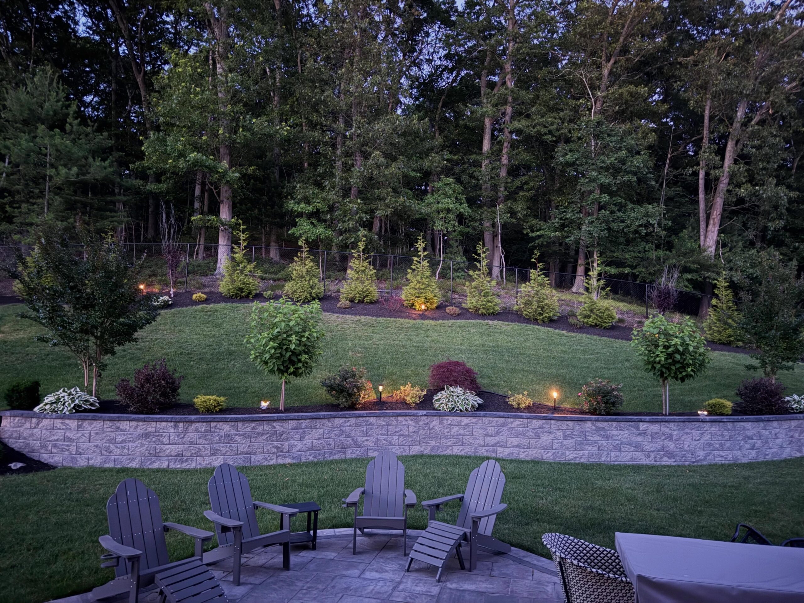 Large Sudbury property with complex landscaping garden beds and trees