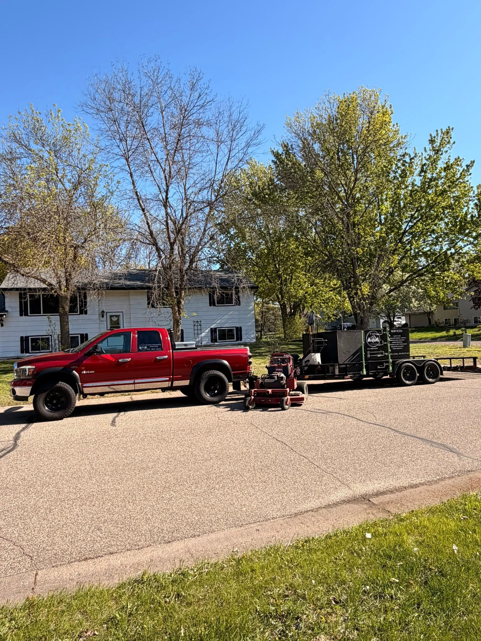 Lawn care company truck arriving on consistent scheduled day in Sudbury Ontario