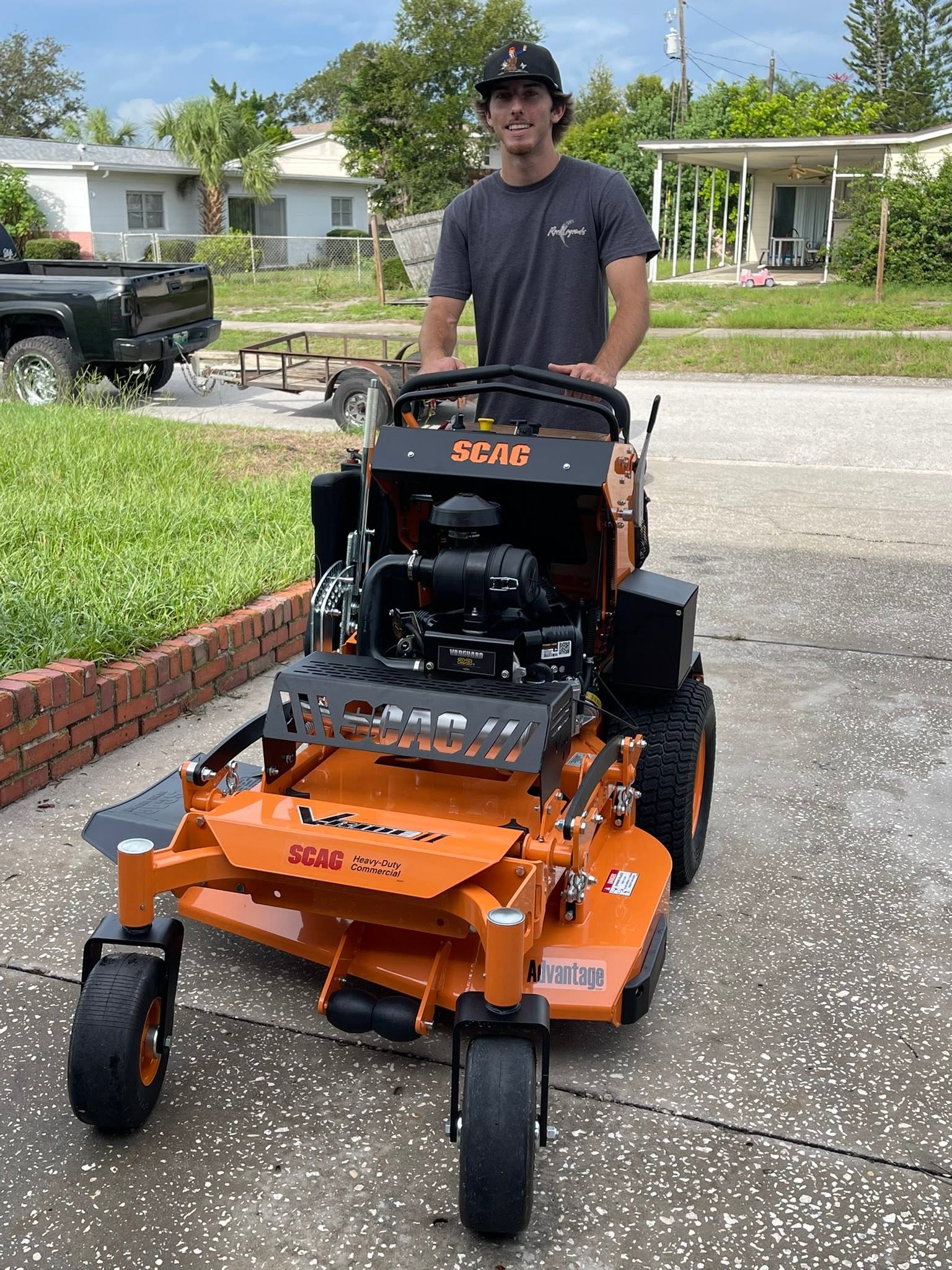 Lawn care crew starting work on a Sudbury residential property in the morning