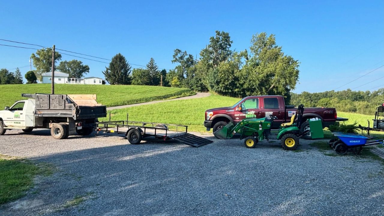 Lawn mowing service truck arriving at a residential property in Sudbury Ontario