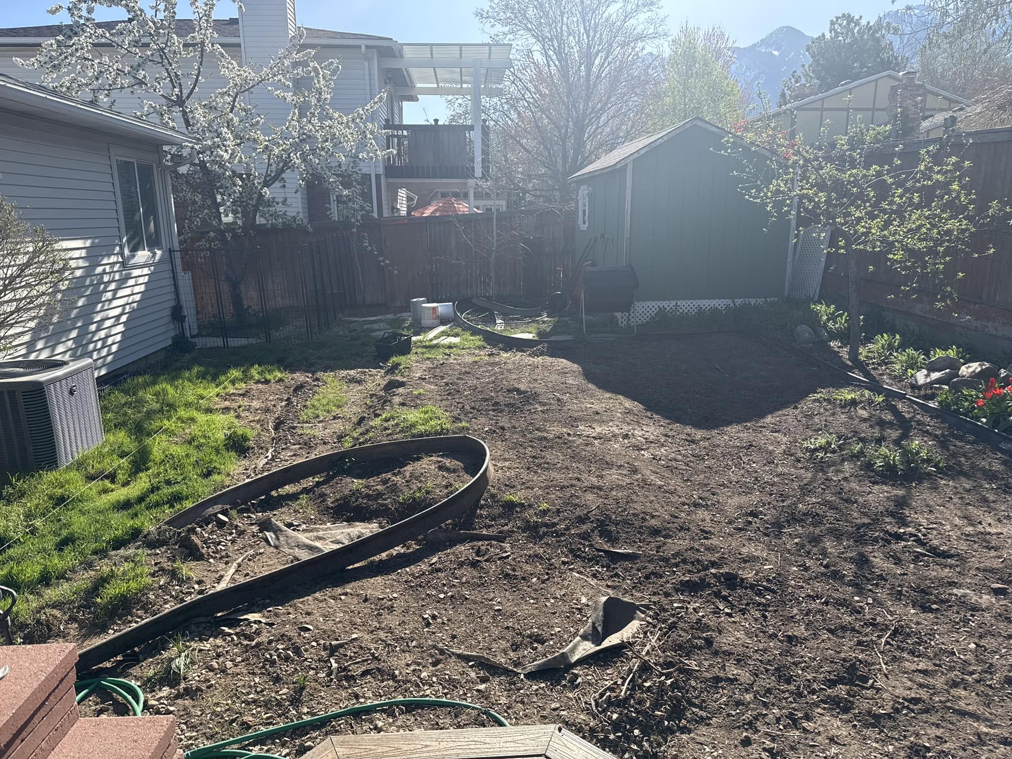 Lawn restoration work being done on neglected Sudbury property in fall