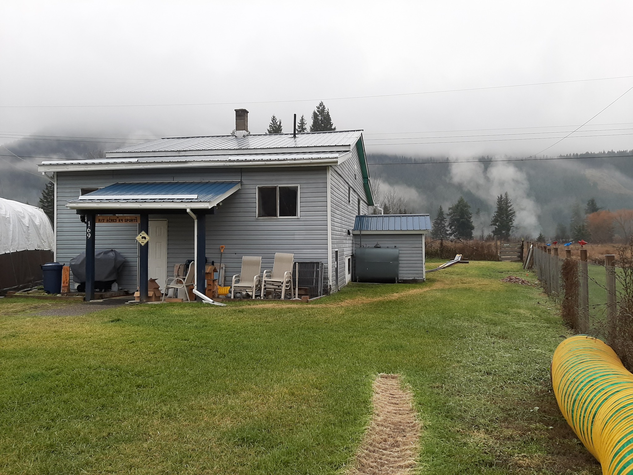 Older residential property with established lawn in Capreol Ontario