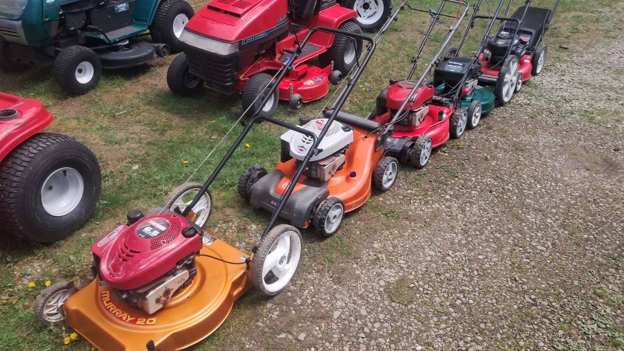 Riding mower and push mower side by side on Sudbury residential property