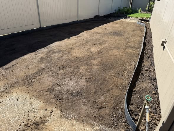 Ryan Lingenfelter assessing neighbourhood lawn soil in Greater Sudbury