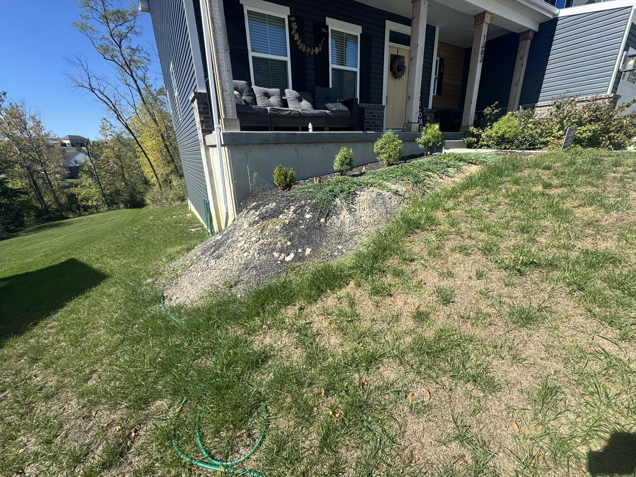 Ryan Lingenfelter correcting foundation clearance grade residential property Sudbury Ontario landscaping