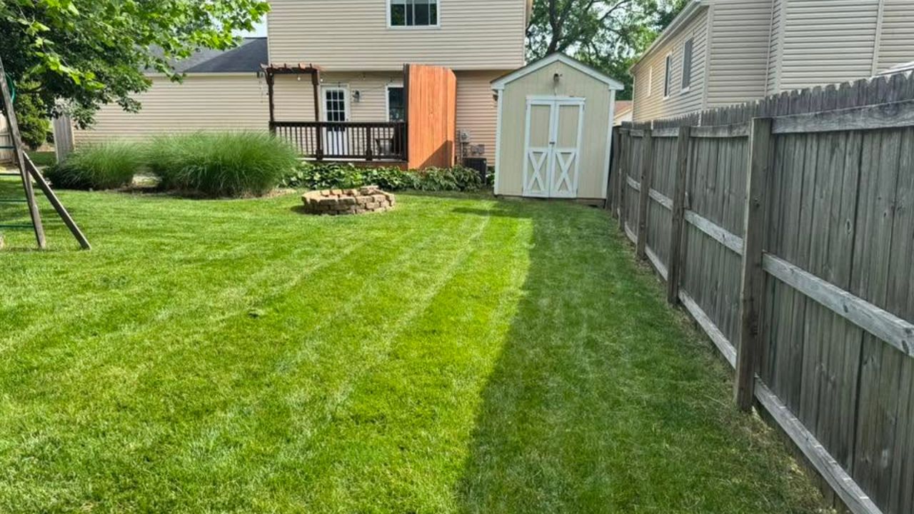 Ryan Lingenfelter maintaining his own Sudbury Ontario lawn using efficient time saving techniques