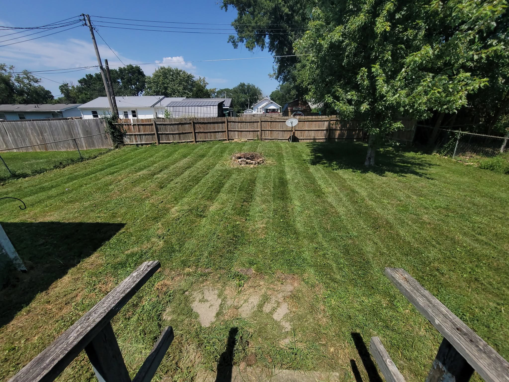 Ryan Lingenfelter reflecting on the honest DIY versus professional lawn care dilemma for Sudbury homeowners