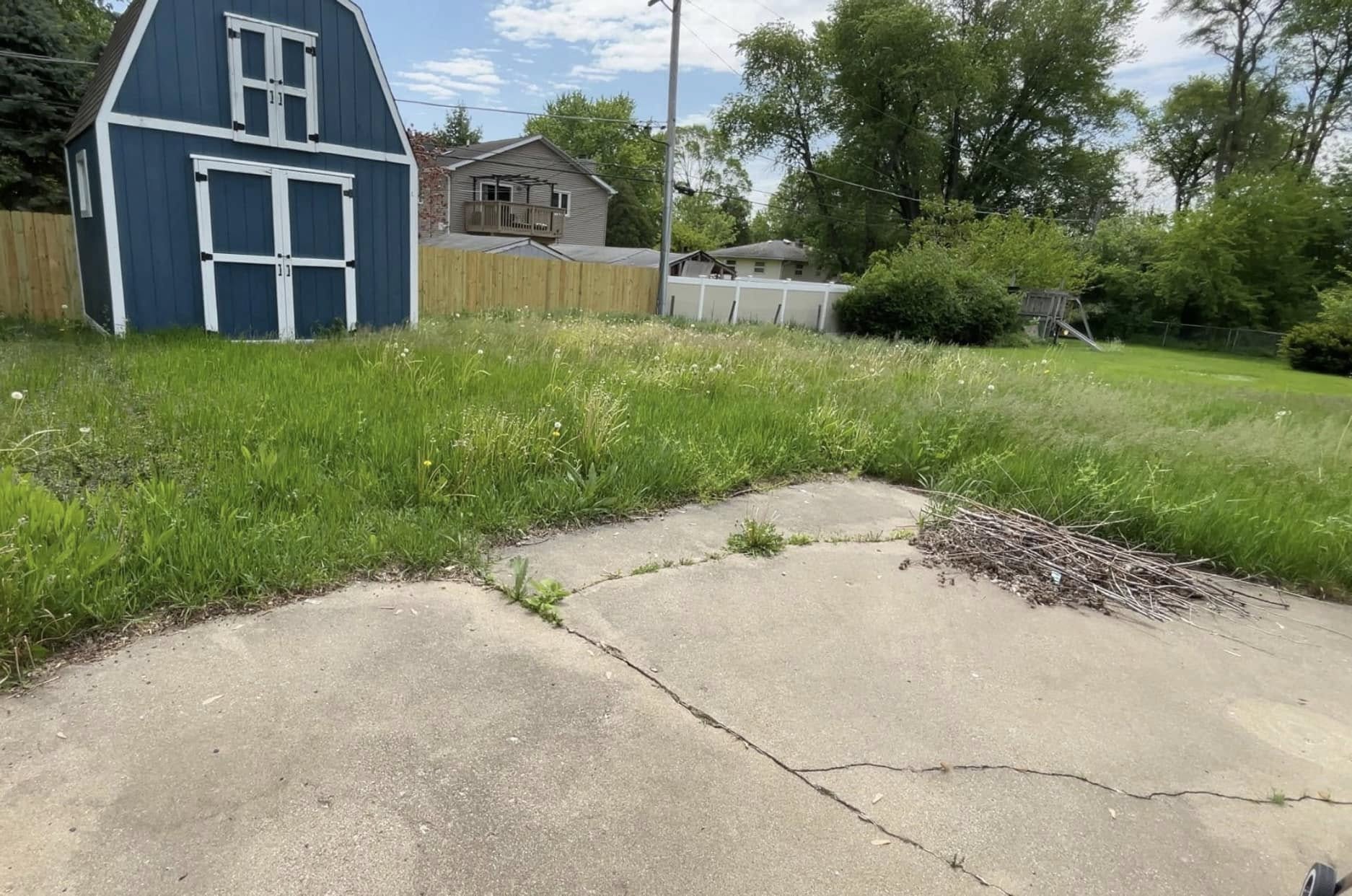 Sudbury Ontario homeowner having initial phone conversation with lawn care company before hiring