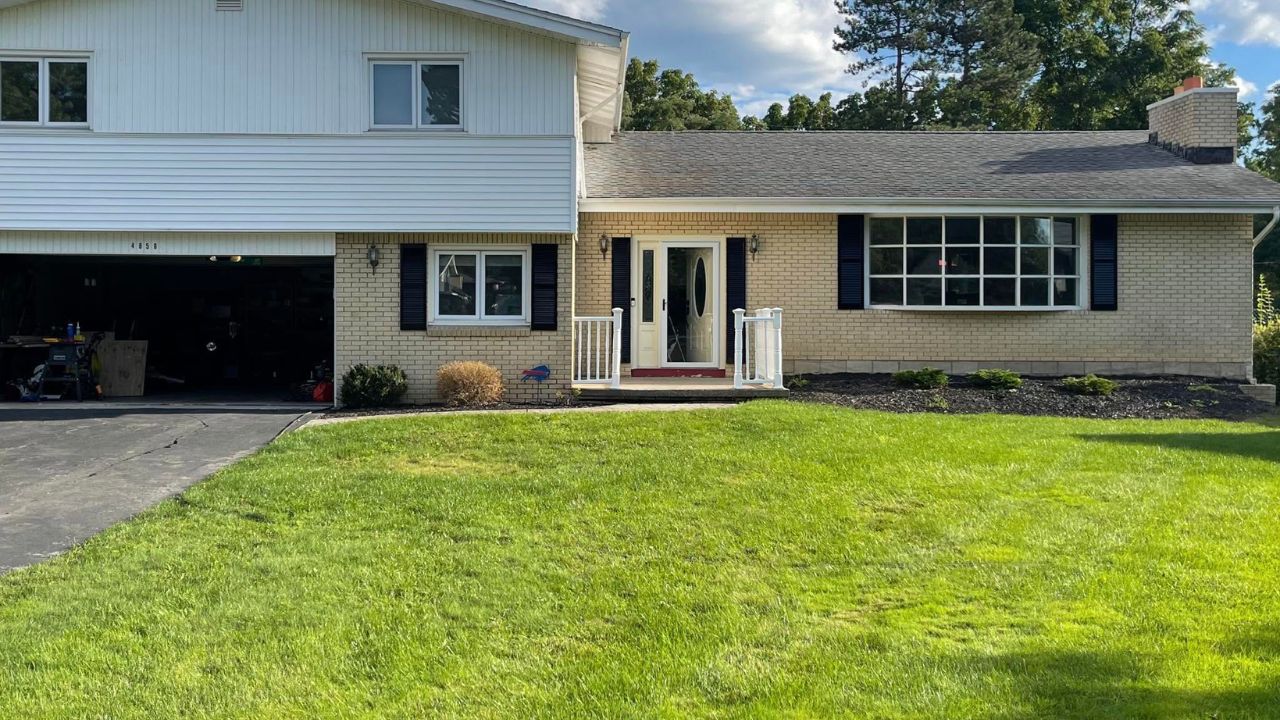 The best looking lawn on a residential street in Sudbury Ontario standing out from neighbours