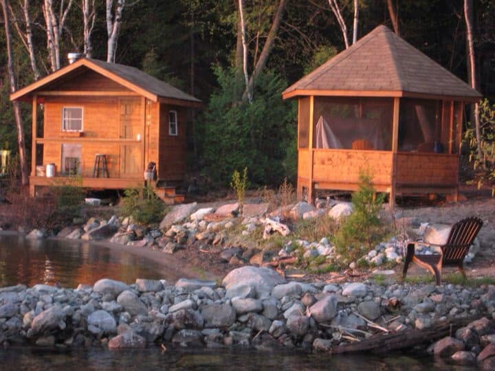 Wahnapitae Lake shoreline with residential property lawn visible Ontario