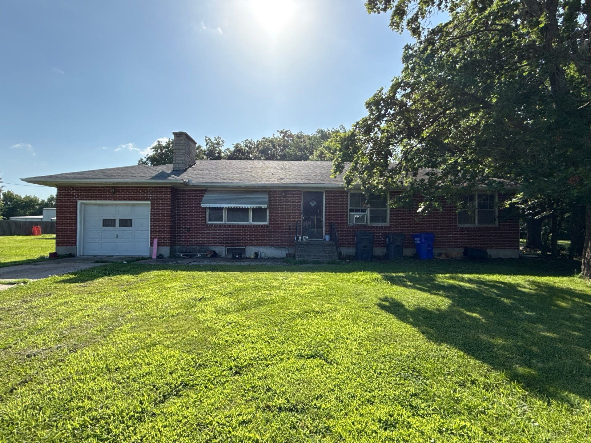 Well maintained lawn on Wahnapitae Ontario property near lake