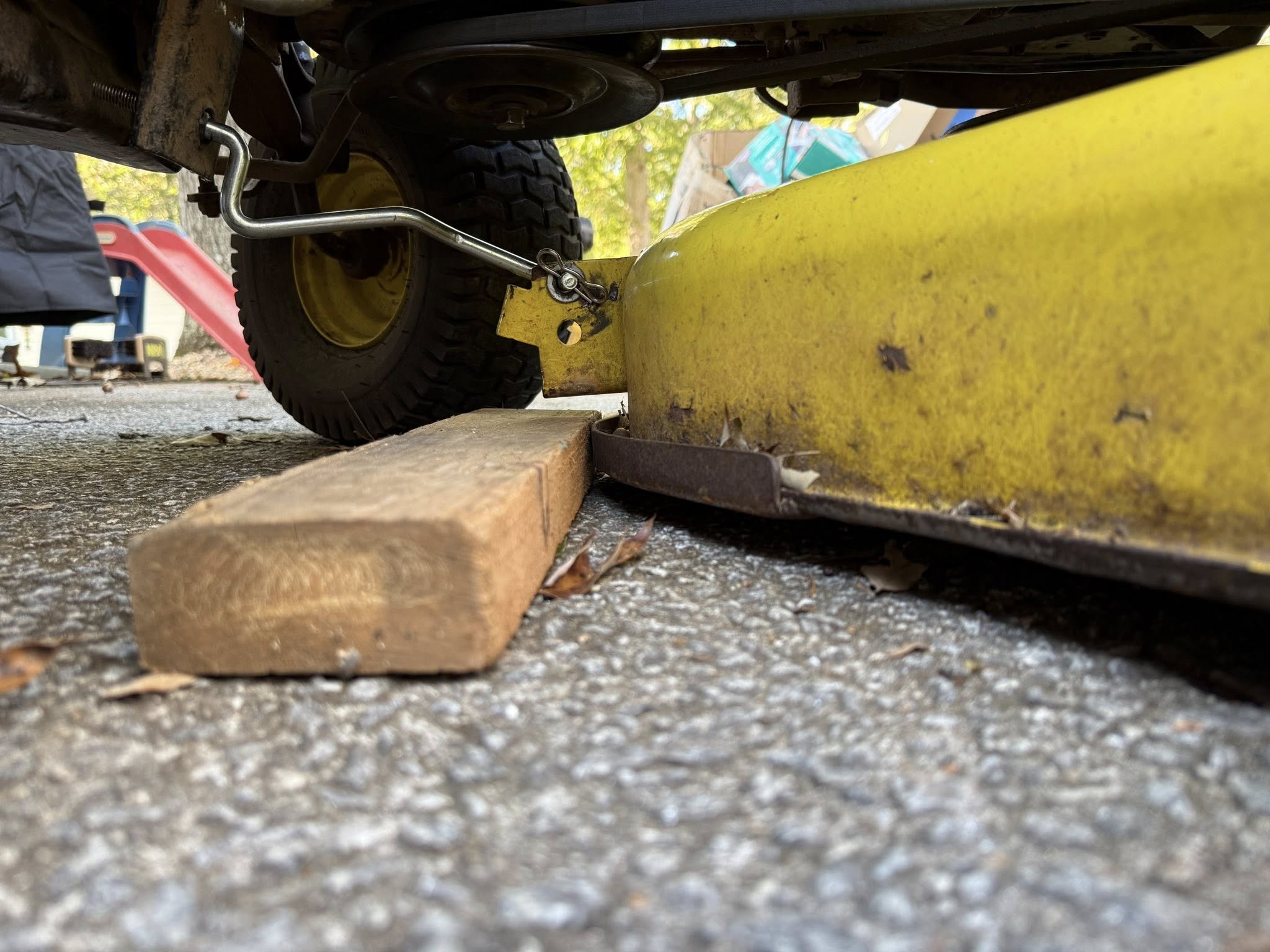 lawn mower deck height adjustment close up residential property Sudbury Ontario