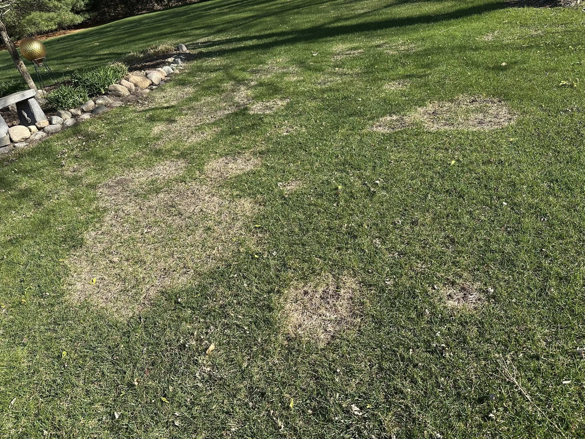residential lawn spring thaw Greater Sudbury Ontario May soil ready aeration