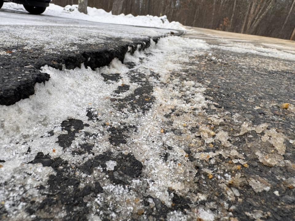 Frost heave damage on interlock driveway in Greater Sudbury winter