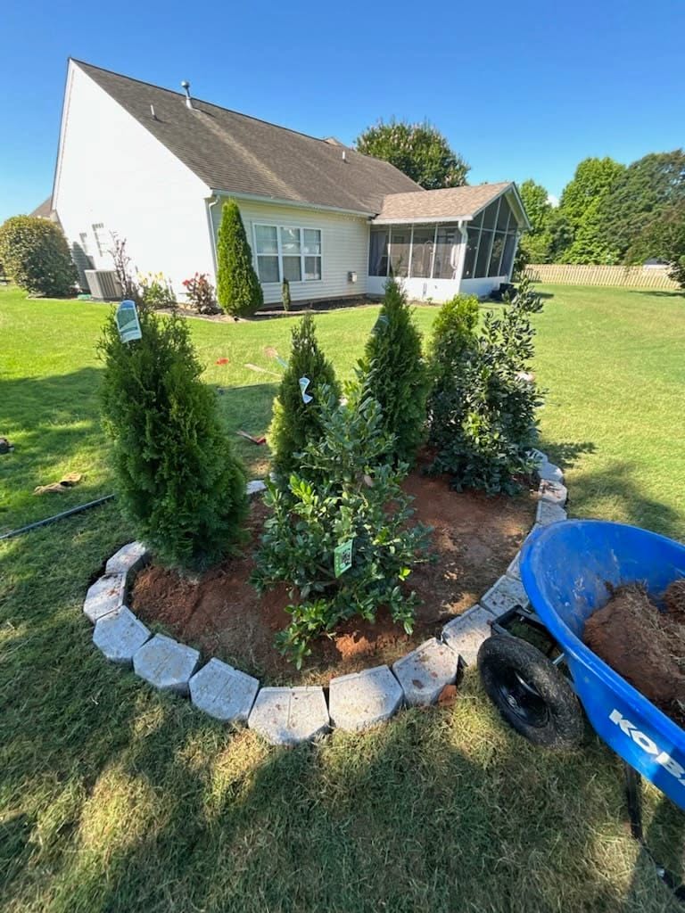 Homeowner watching landscaper work on Sudbury property with unmet expectations