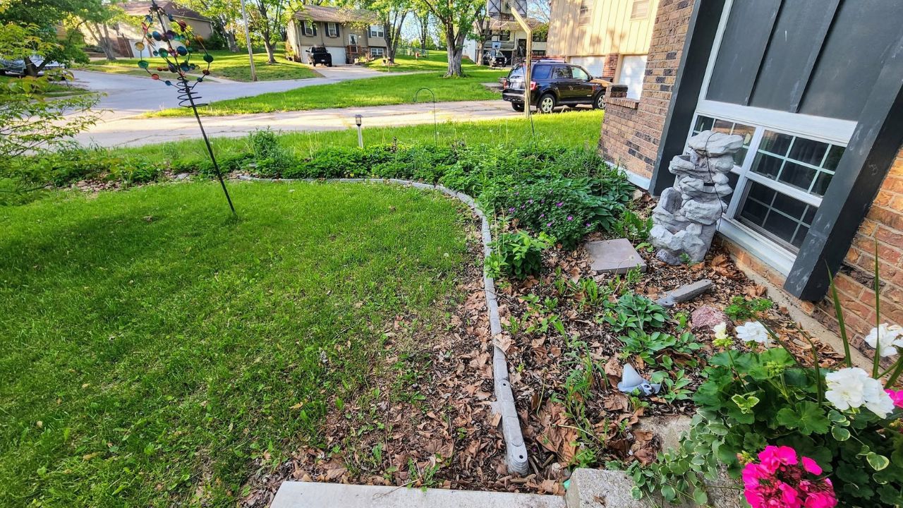 Ryan Lingenfelter assessing residential property for landscaping work Greater Sudbury Ontario local installer